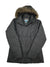 The Columbia Women's Lone Creek Insulated Jacket is a black, quilted winter coat with a zipper closure and hood lined with brown faux fur, shown flat on a white background.