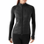 A woman is wearing the fitted black Women's Phd Smartloft Hoody, featuring quilted panels, a high collar, long sleeves, a zippered chest pocket, and SmartLoft insulation. She pairs it with black pants.