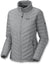 The Women's Nitrous Down Jacket is a light gray, quilted and insulated Mountain Hardwear jacket with 800-fill down, front zipper, two zippered side pockets, high collar, and both horizontal and diagonal stitching.